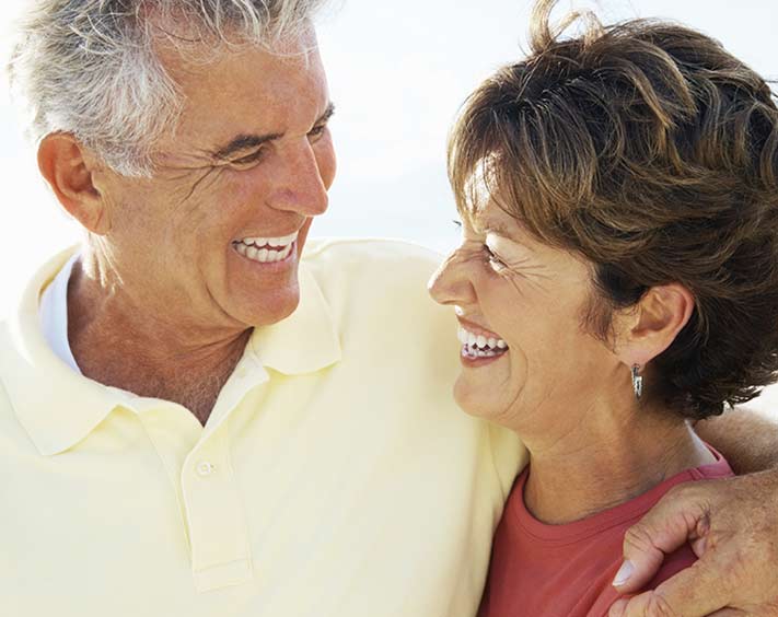 couple with hearing aids