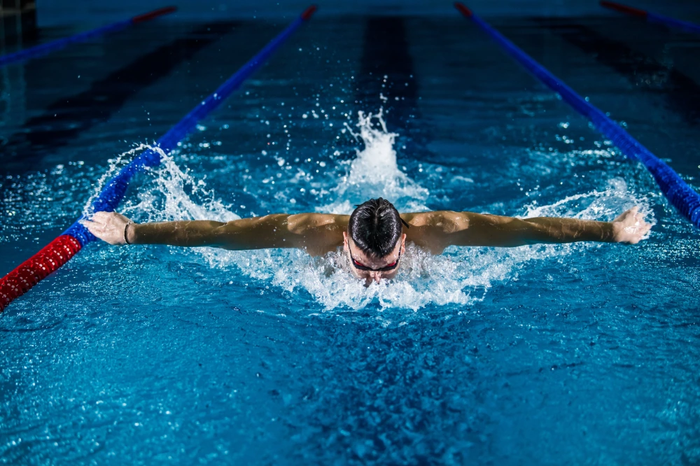 swimmer photo credit gentrit-sylejmani-JjUyjE-oEbM-unsplash