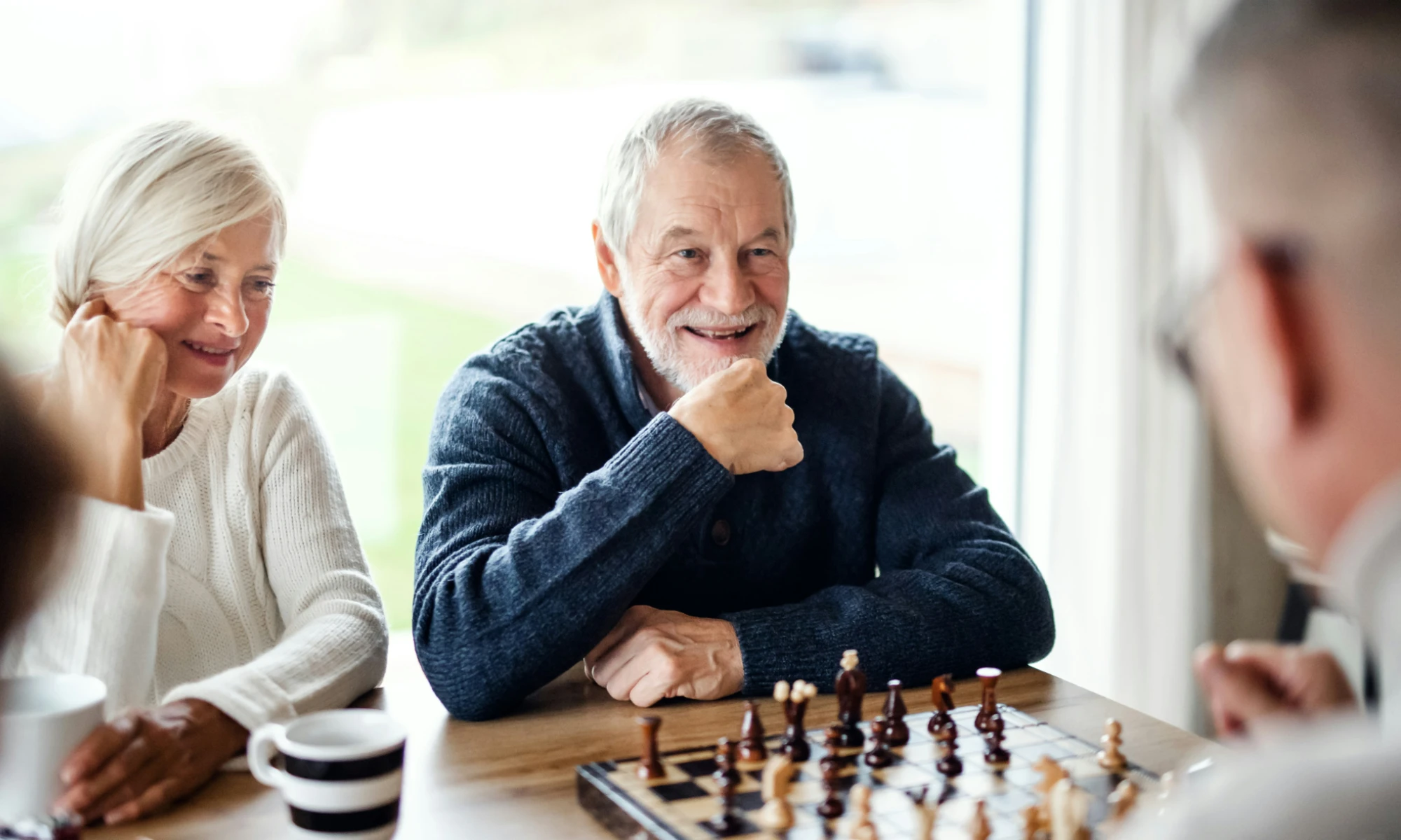 older couple playing chess getty-images-hO2XckLgwhc-unsplash